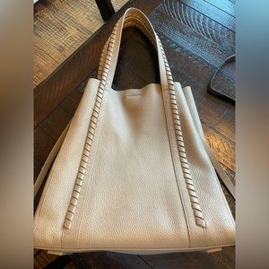 Allsaints bag in excellent condition.  Beautiful taupe color.Dust bag included.